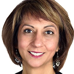 Vanita Bellen PCC headshot photo, smiling woman with brown hair