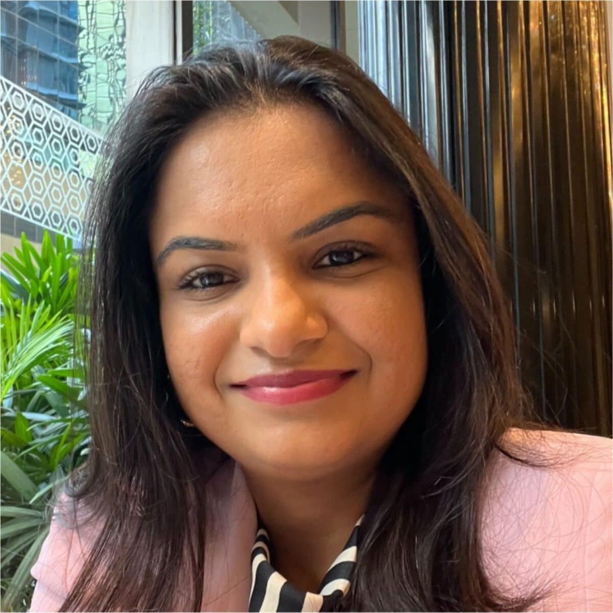 Headshot of Shruti Sonthalia, Author and Speaker with the International Coaching Federation. Known for her executive coaching expertise with senior leaders.