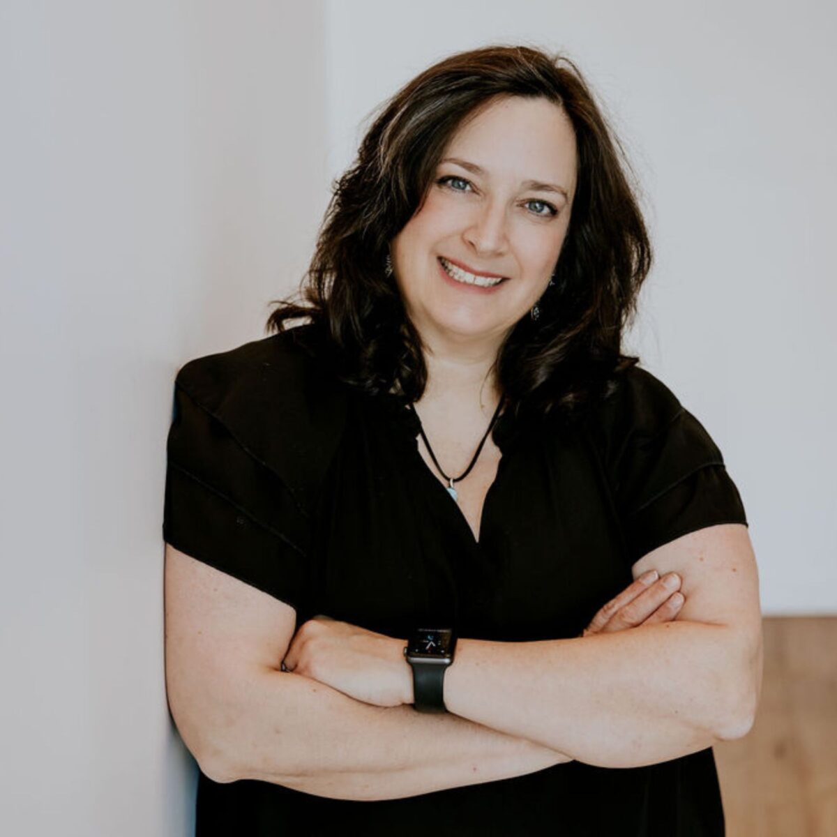 Headshot of Kim Eusepi, Author with the International Coaching Federation. Known for leadership in building supportive cultures for organizations.