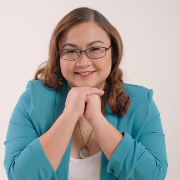 Headshot of Kristine “Kurly” Guzman, blog contributor with the International Coaching Federation Federation. Known for supporting leaders, professionals, and coaches in thriving in their careers with meaning and purpose.