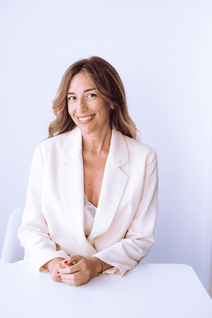 Headshot of Monica Albuja, a group leader for coaching science