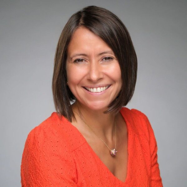 Headshot of a women named Dominique Mas.