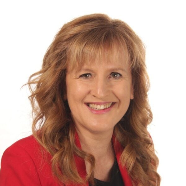 Headshot of Rossella + Pin, author with the International Coaching Federation. Known for for her "everything is possible" attitude, making her an inspiring learning leader and speaker.