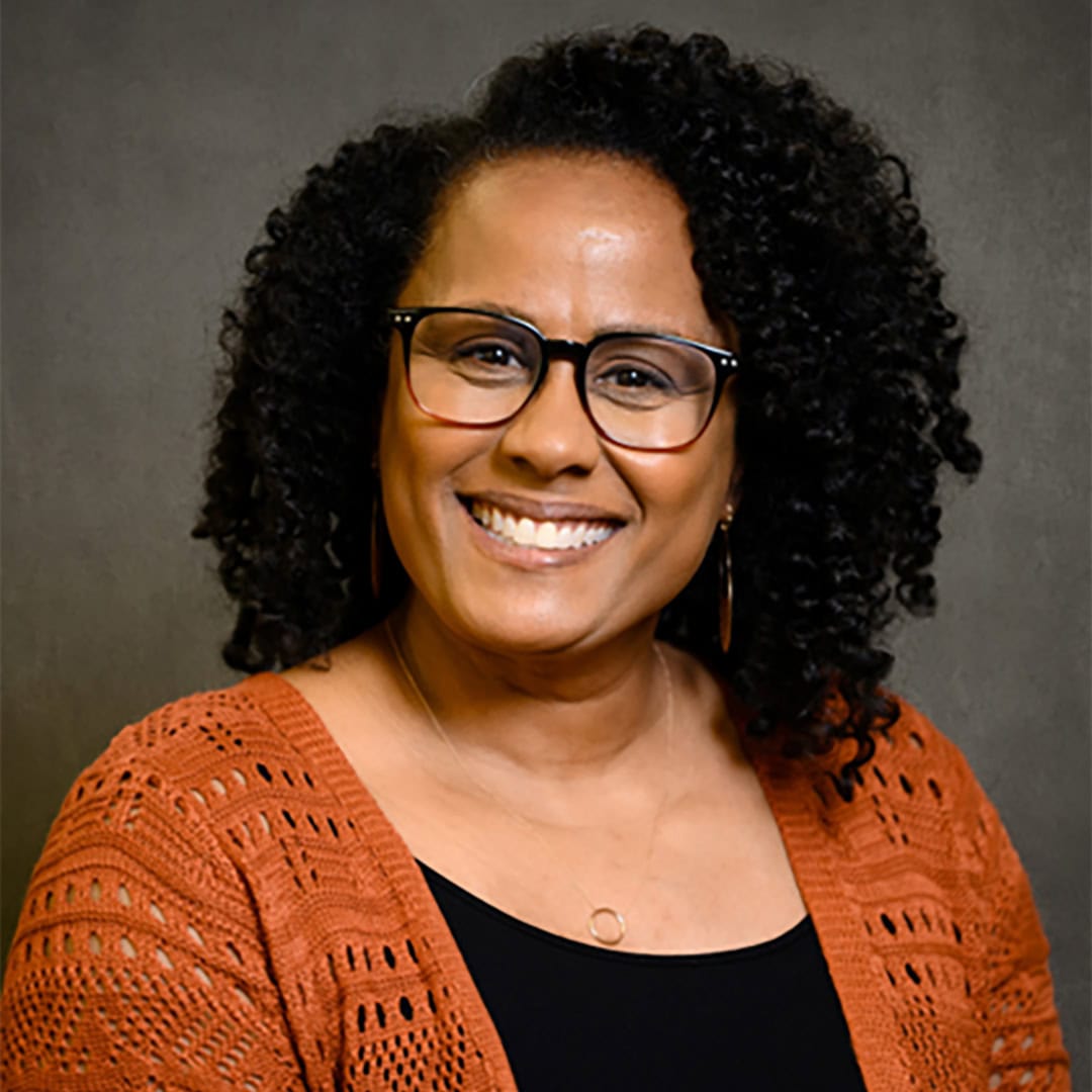 Headshot of Angela Carter, a consultant with the International Coaching Federation. Known for her work in diversity, equity, inclusion, and belonging (DEIB).