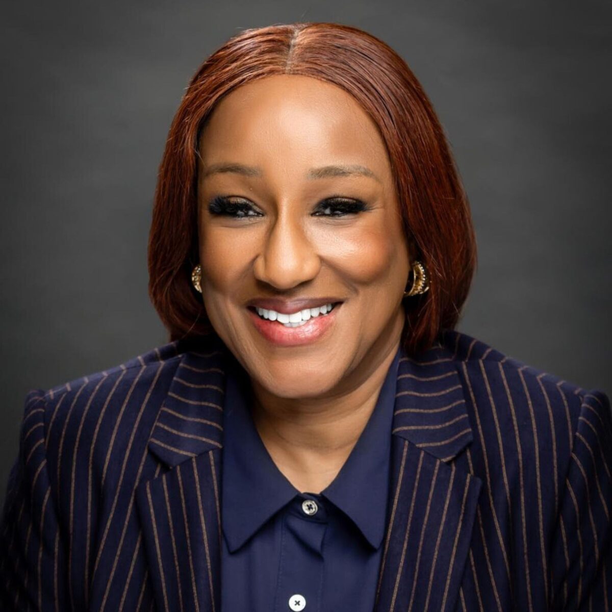 Headshot of Adaora Ayoade, Board Member with International Coaching Federation