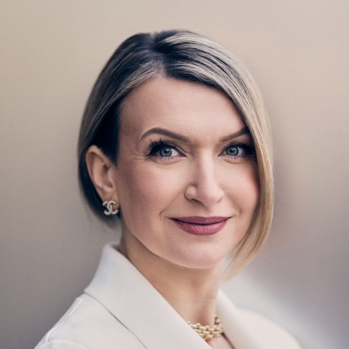 Headshot of Maria Wade, Author with the International Coaching Federation. Known for her expertise in executive coaching.