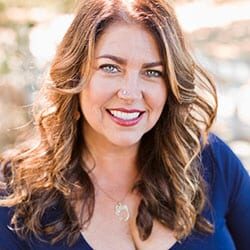 Teresa Lodato PCC CPCC headshot photo, smiling woman with long brown hair outside