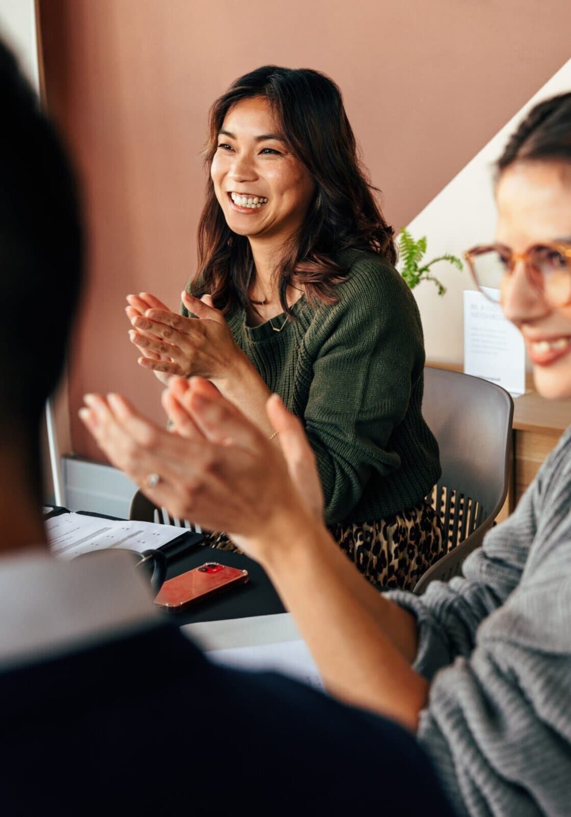 Cheerful,Businesspeople,Applauding,During,An,Office,Meeting.,Group,Of,Multicultural