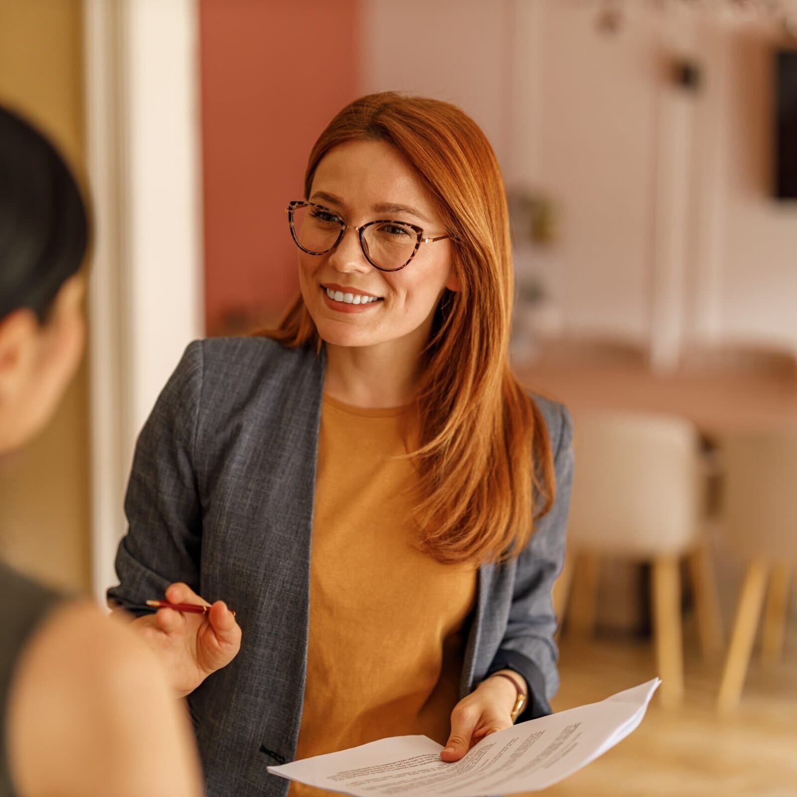 Smiling,Female,Manager,In,Eyeglasses,Holding,Document,Explaining,Project,Details