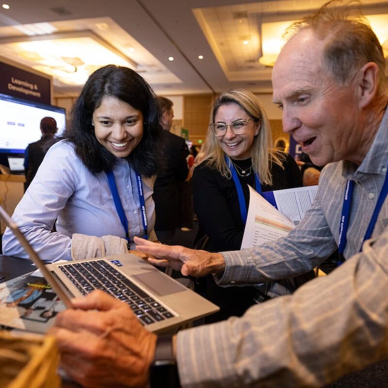 icf-mkt-converge-small-group-at-computer